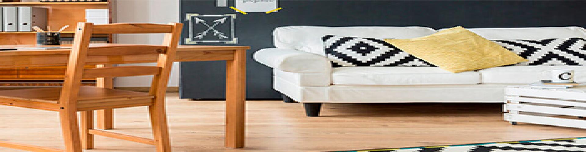 Hipoteca Tipo Variable distribuidor - Salón de una casa con sofá y mesa  - Rural Kutxa